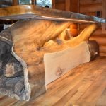 Tree island with bear carving