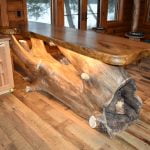 Tree island with bear carving